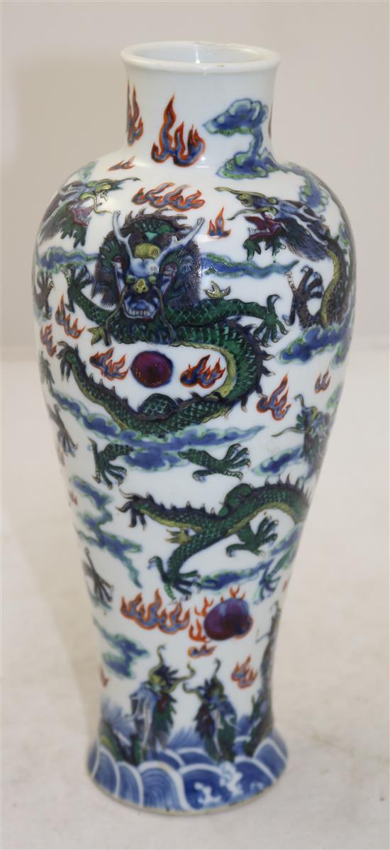 A Chinese clobbered blue and white meiping, 19th century, 26cm